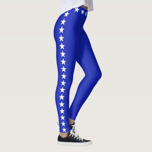 Glittering white stars on royal blue leggings